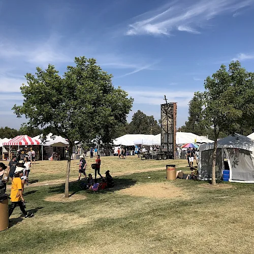 Festival-goers among the food and vendor tents at the Gilroy Garlic Festival